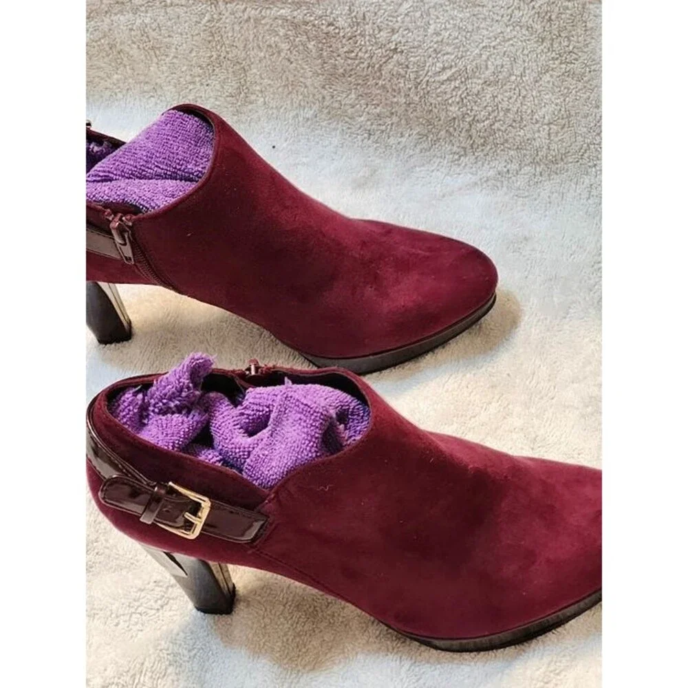 Women’s East 5th faux suede ankle booties in a rich maroon color with glossy pat